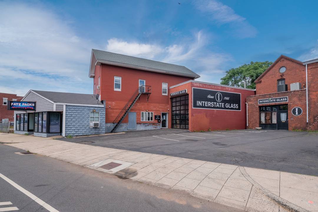 Unlock the potential of this well located mixed use building offering a dynamic blend of industrial, office, retail, and residential space.