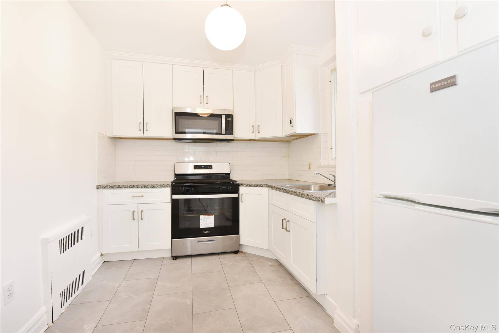 Move In Ready Renovated Condo in the Heart of Rego Park !