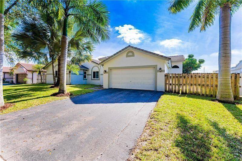 NO HOA ! This beautifully remodeled 4 bedroom, 3 bath pool home, 2 car garage fenced yard is located in the highly sought after Royal Palm South neighborhood.