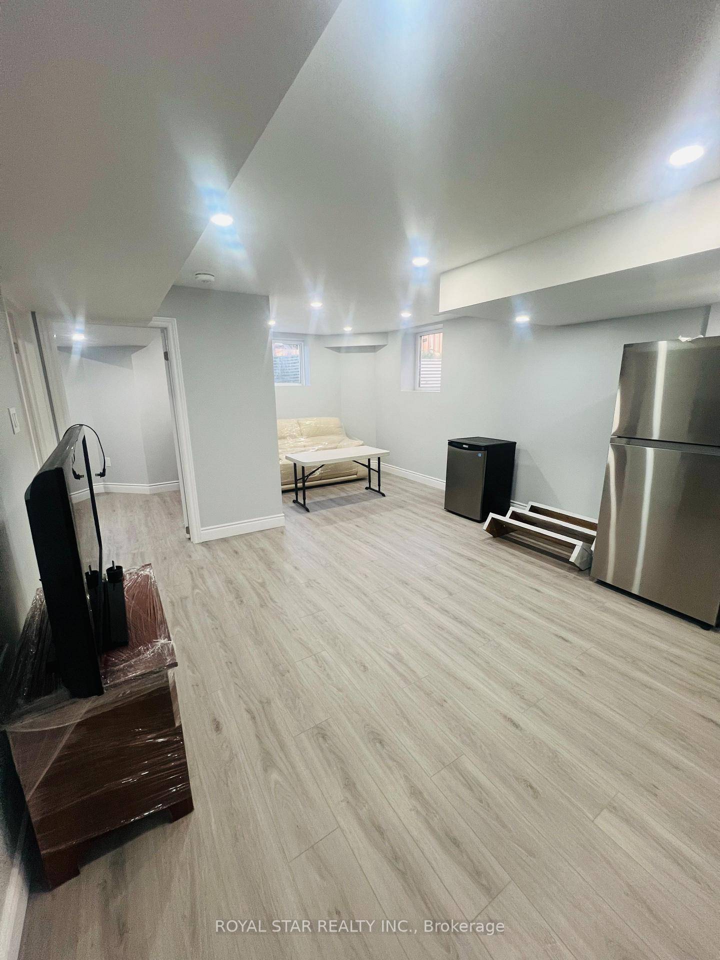 Step Into Less Than A Year Built Basement Where Comfort Meets Modern Living.