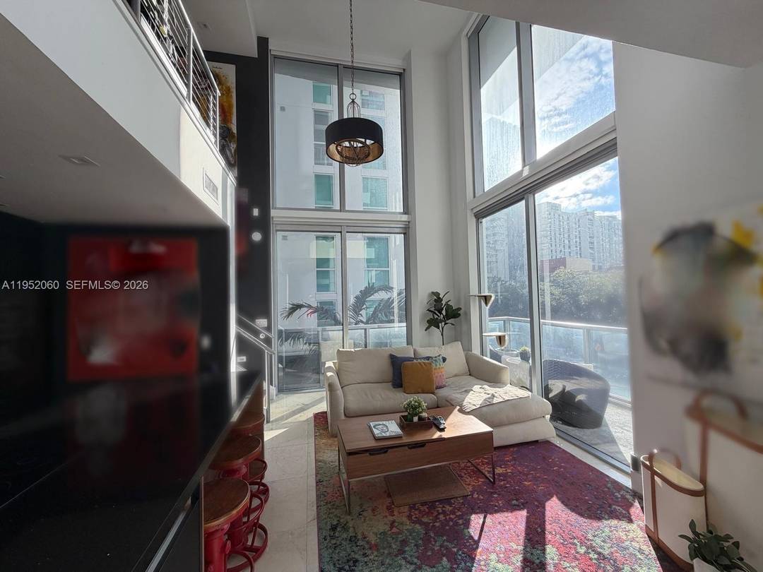 Step into this super modern, completely remodeled loft in the heart of Brickell, where design meets technology.