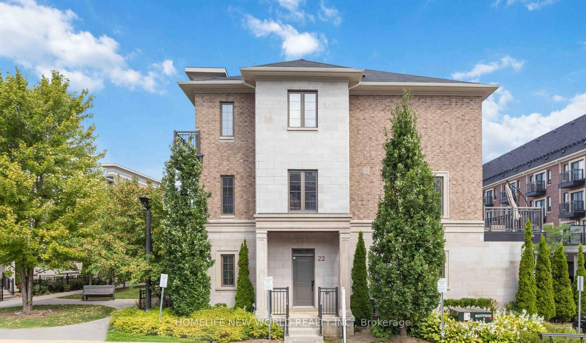 Luxurious Corner Townhome with 2 Car Garage.