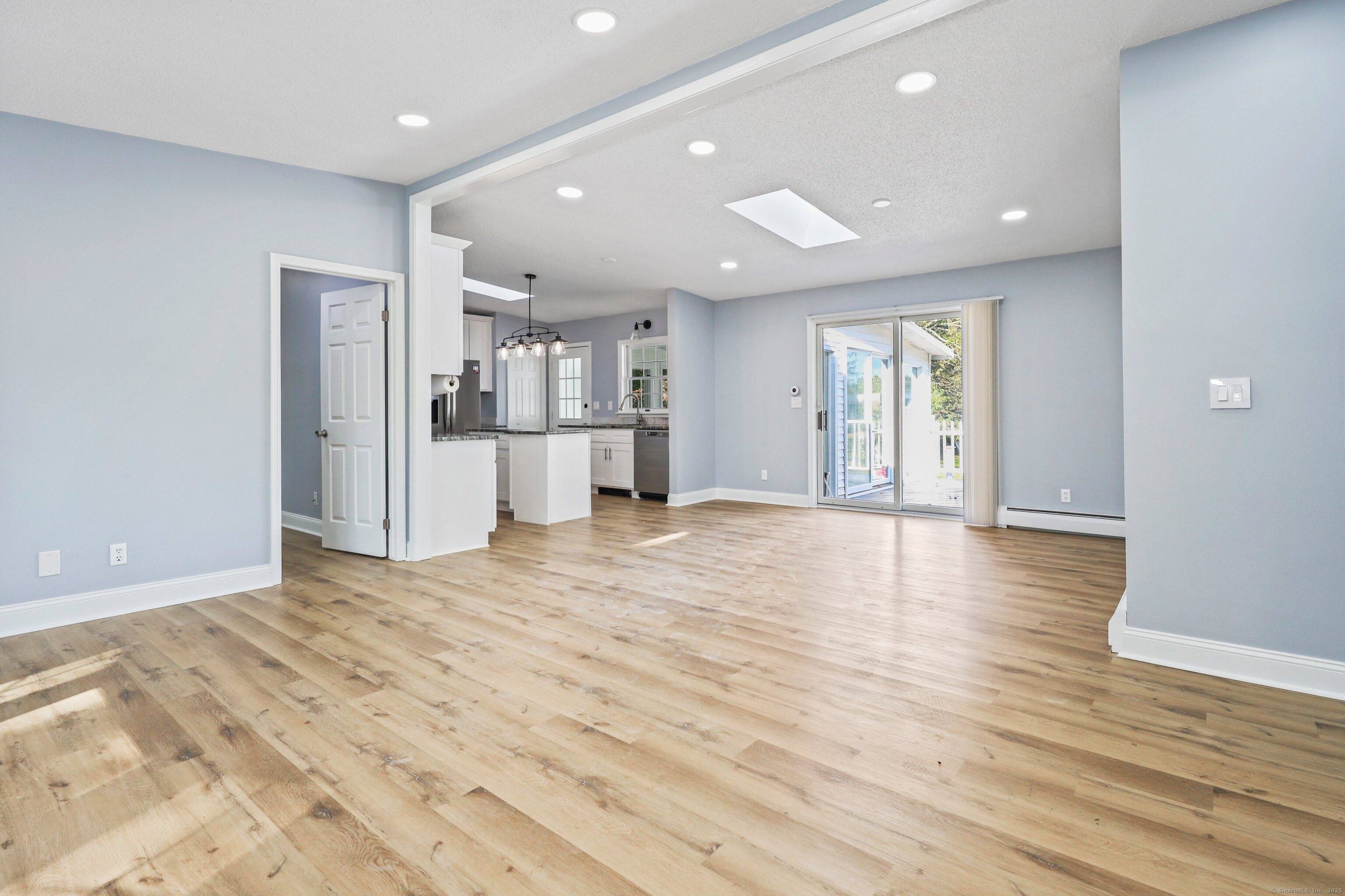 Step into this stunning ranch featuring a unique horseshoe driveway and ample space to subdivide the lot.