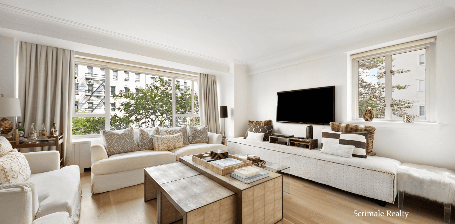 This split two bed two bath residence features bright northern and eastern exposure and beautiful tree views.