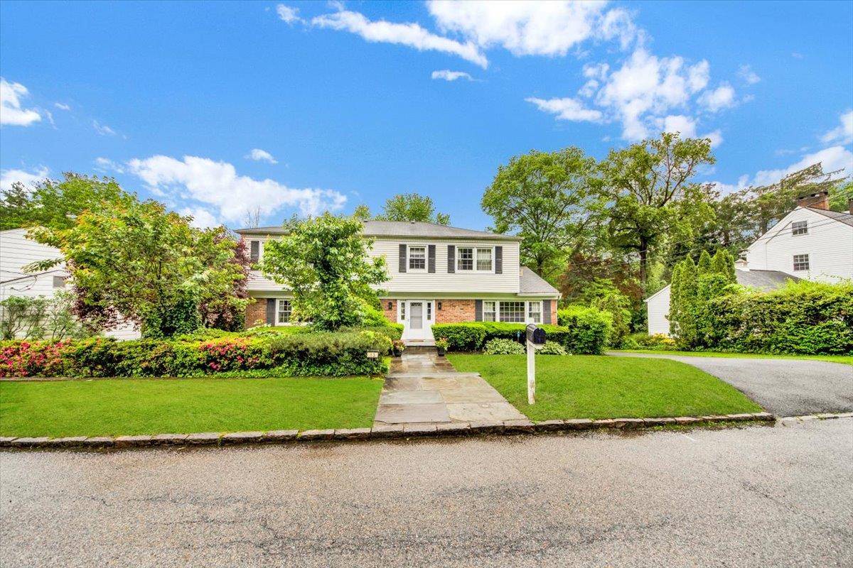 Bright and sunny Colonial in wonderful location and in move in condition.