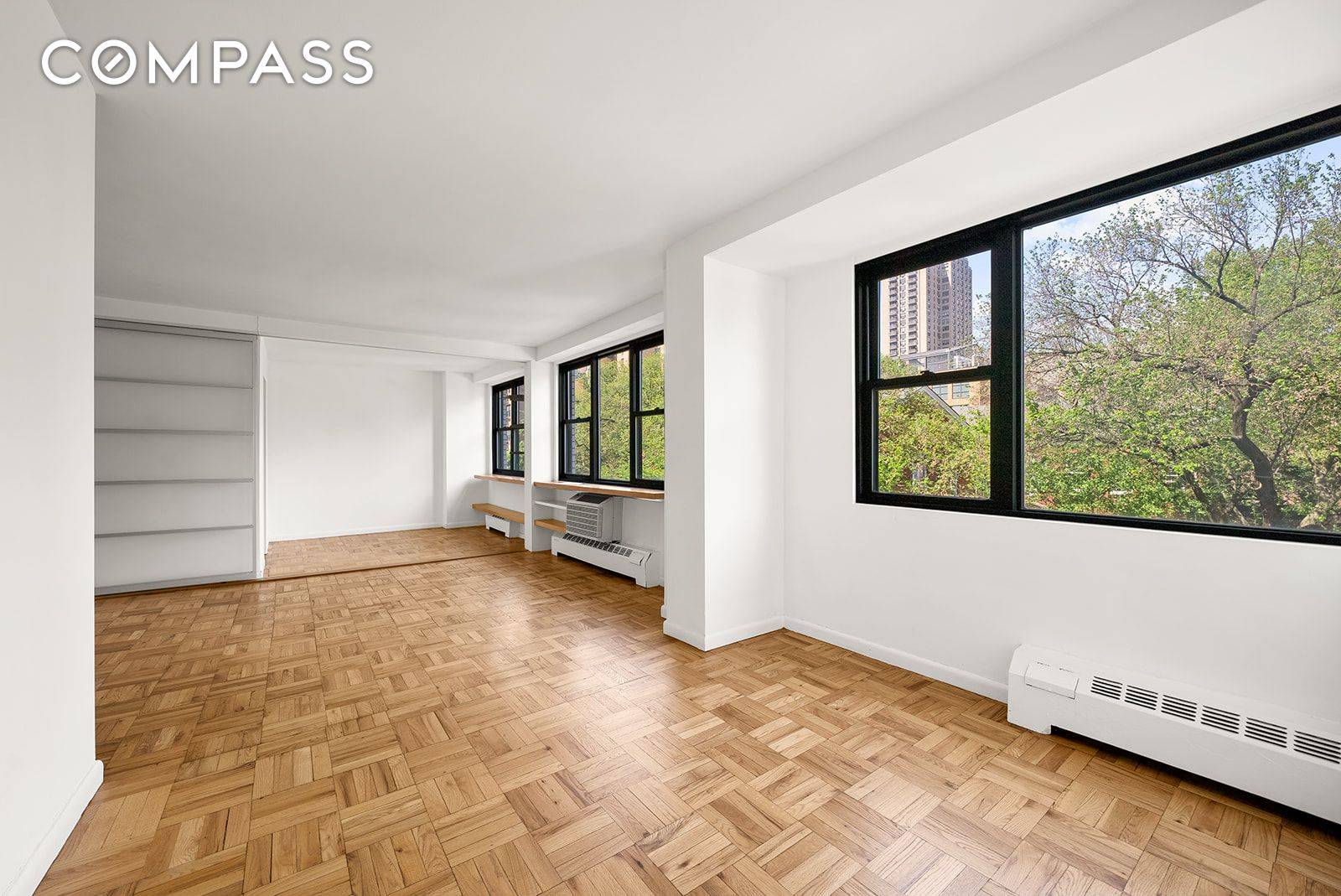 With 40 feet of north facing windows overlooking Stuyvesant Square Park, this tree level two bedroom, two bathroom home offers exceptional privacy and a peaceful, picture perfect view.
