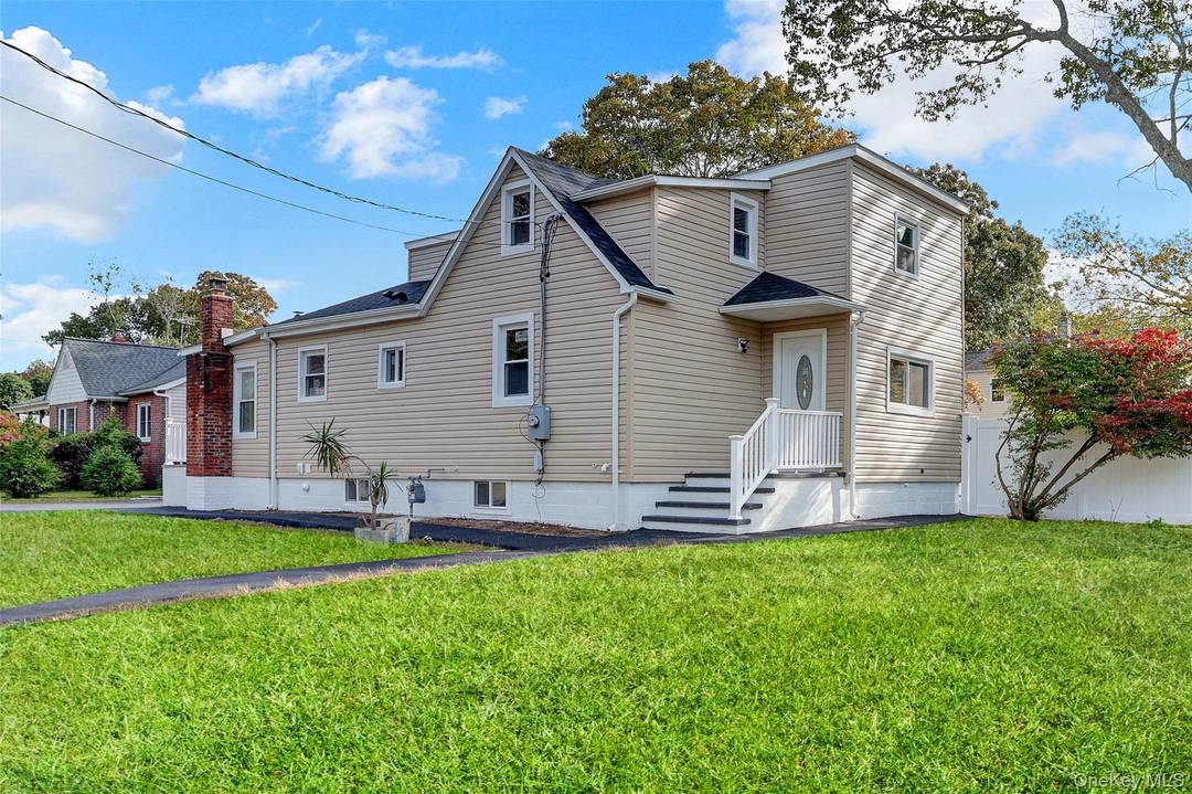 Beautiful Fully Renovated Home, Corner property, with Very Low Taxes !