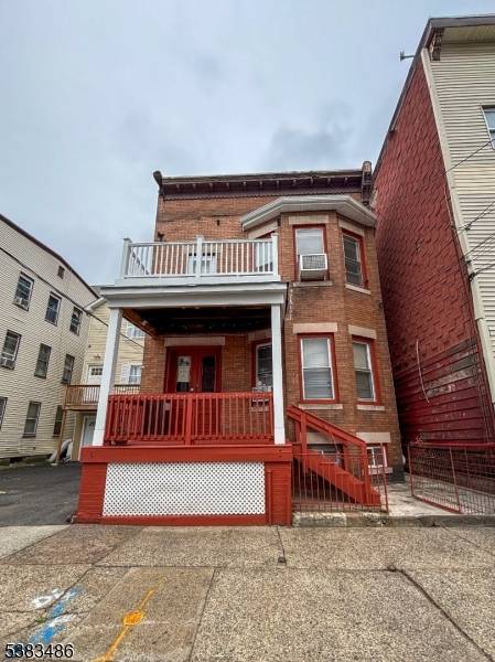 Welcome to this spacious and well maintained solid brick home offering comfort, versatility, and exceptional value in the heart of Paterson.