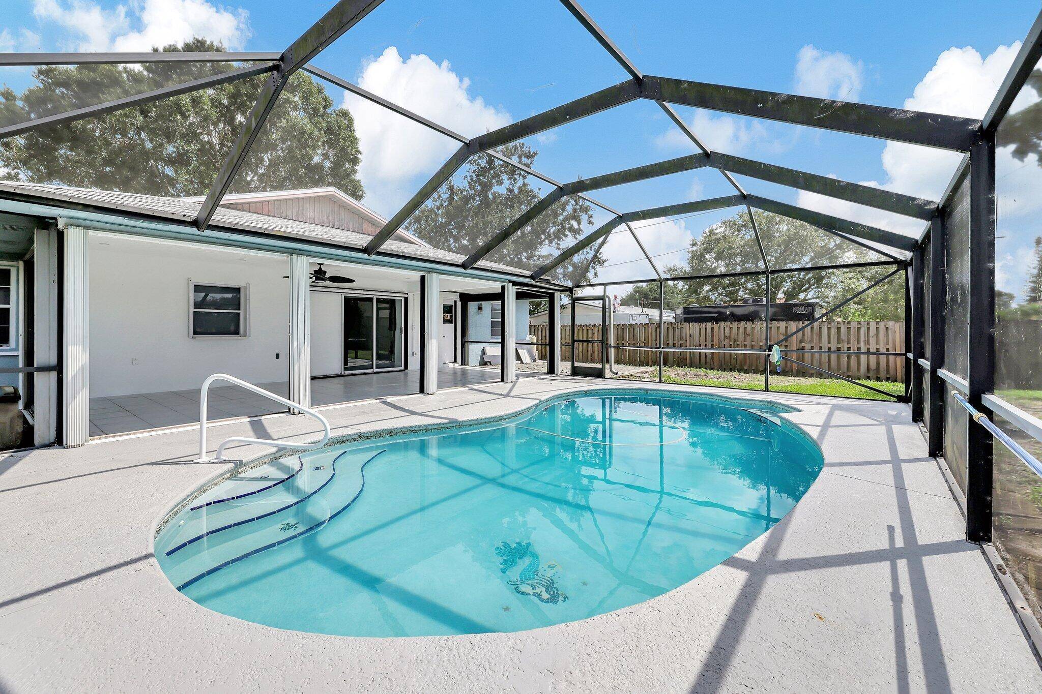 Welcome to this beautifully renovated 3 bedroom, 2 bath home tucked away on a peaceful street in Port St.