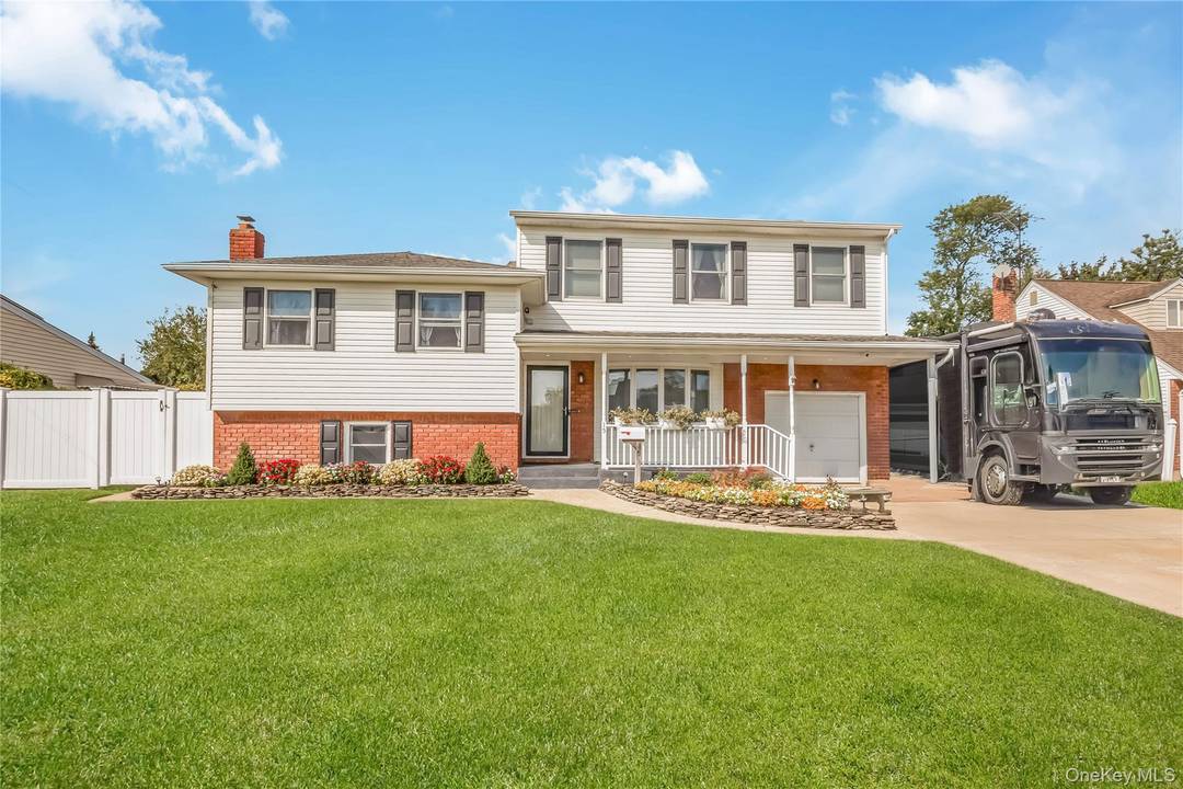 Welcome to this stunning four level split home, offering five bedrooms and 2, 5 beautifully updated baths.