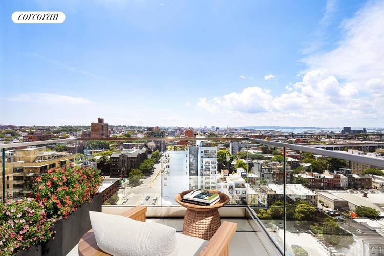 Southwestern Facing Designer one bedroom with Lower Manhattan, Downtown Brooklyn and NY Harbor Views and a private balcony.