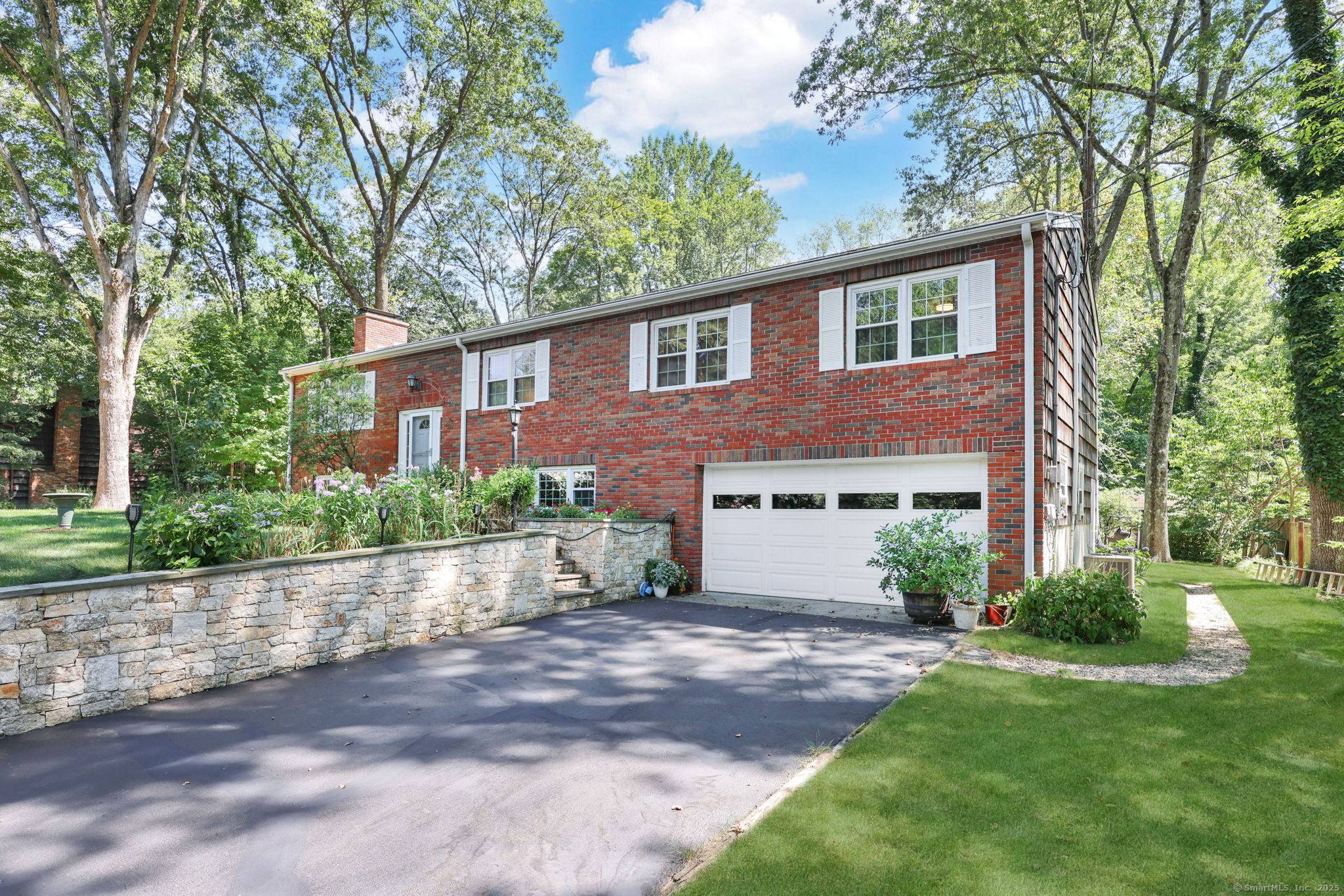 Nestled in the desirable Whitney Farms community, this 4 bedroom, 3 full bath raised ranch blends modern updates with inviting warmth.