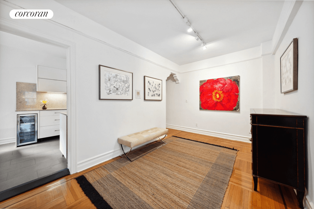Elegant and spacious, this two bedroom, two bathroom residence with a flexible formal dining room or home office is conveniently located in the heart of historic Jackson Heights.