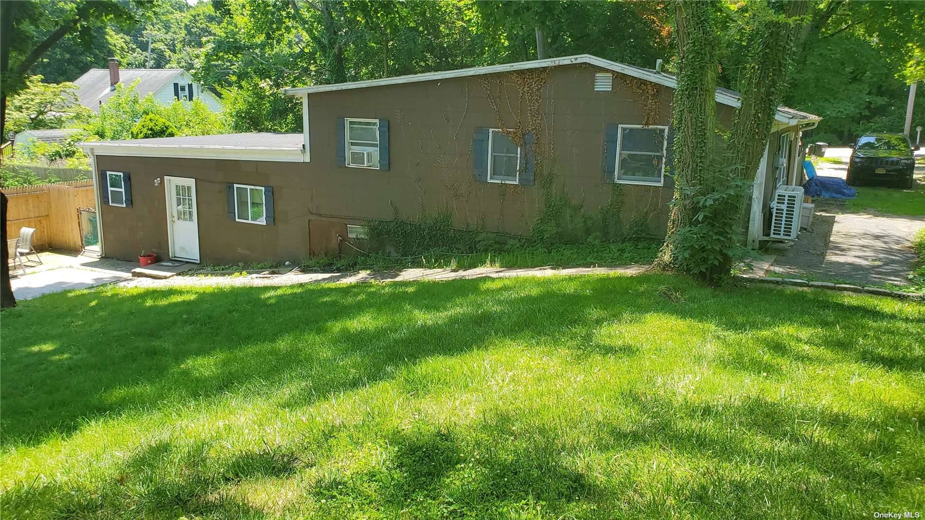 Legal 2 apartment duplex Low Taxes Great Investment walk to beach shopping wineries Owner willing to partially finance