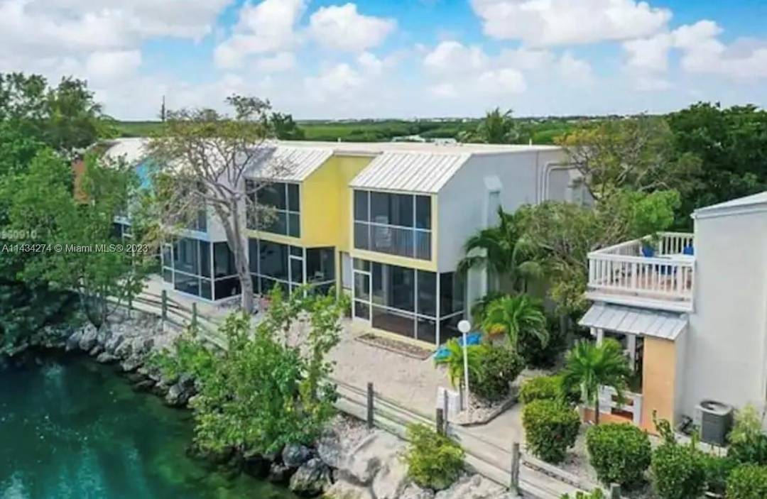 Salt Life in this Gorgeous 2 Bedroom 2 Bath corner unit Townhouse on the Ocean with amazing views of the Salt Water Lagoon and Mangrove.