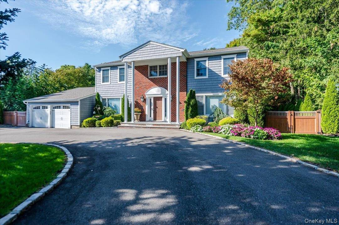 Welcome to a life of luxury in the heart of Muttontown, where your dream home awaits.