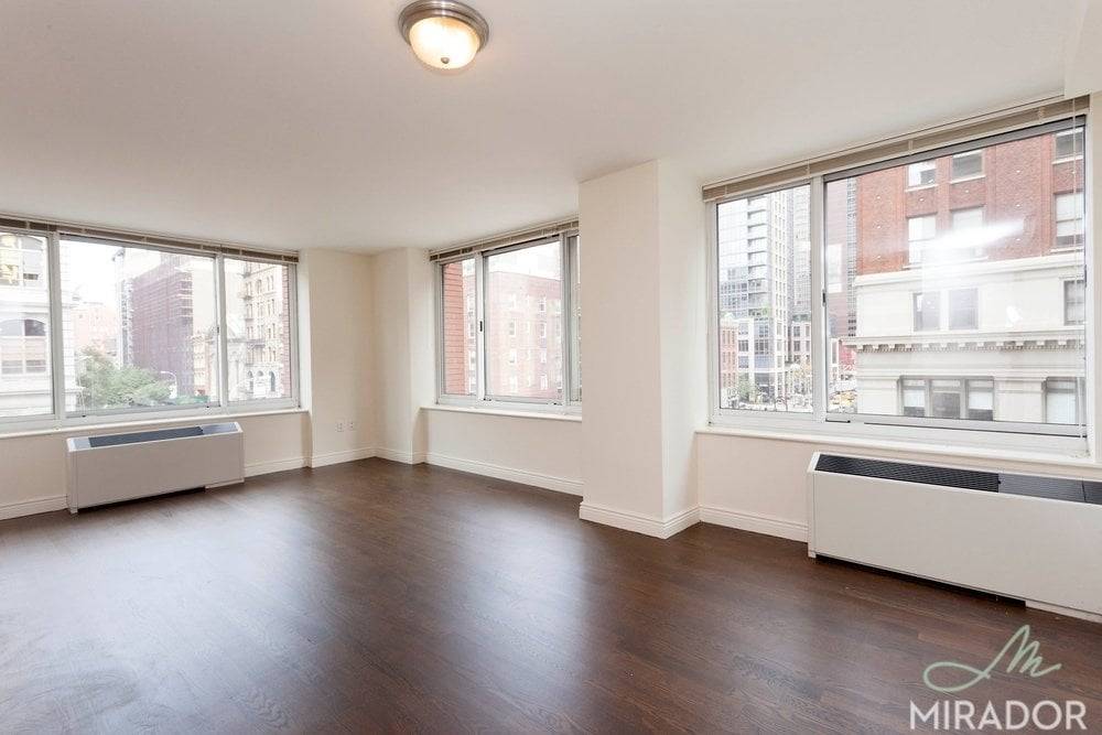 Stunning large northwest facing corner 2 bedroom 2 full marble bath with a vented washer dryer in unit on the 10th floor of The Caroline.