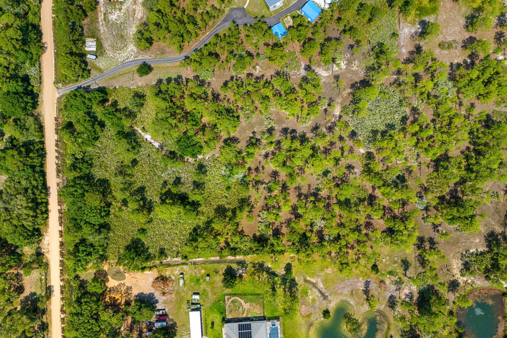 Situated within the rural enclave of Fellsmere Farms, this 4.