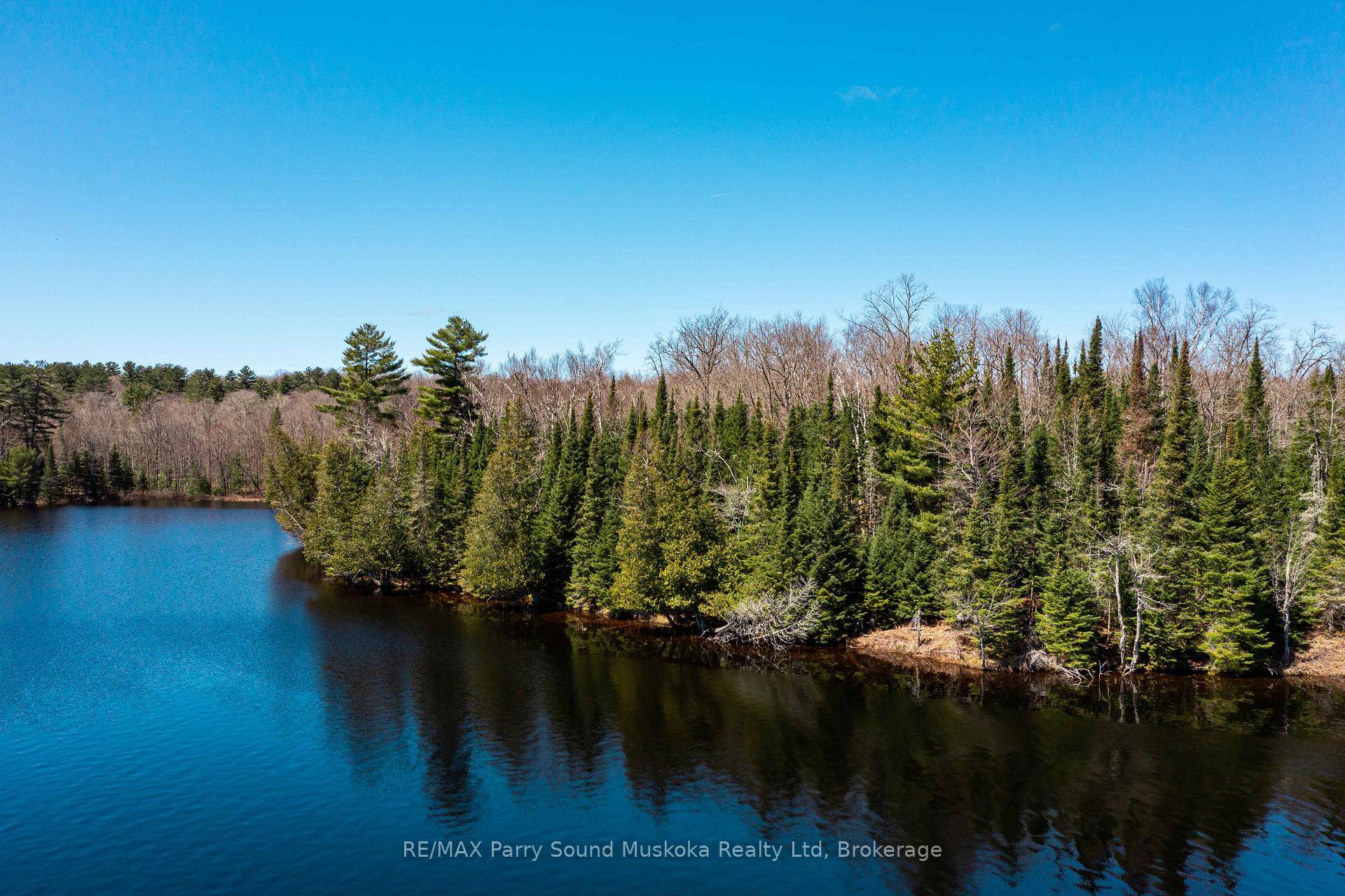 This prime point of land lot offers an incredible 1, 416 feet of shoreline and 9.