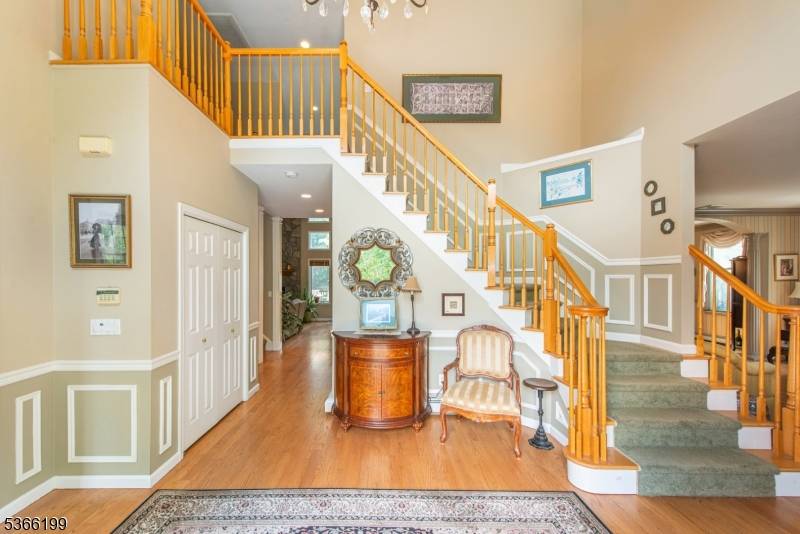 A Weiss custom built Colonial, this expansive 6 bedroom, 5.