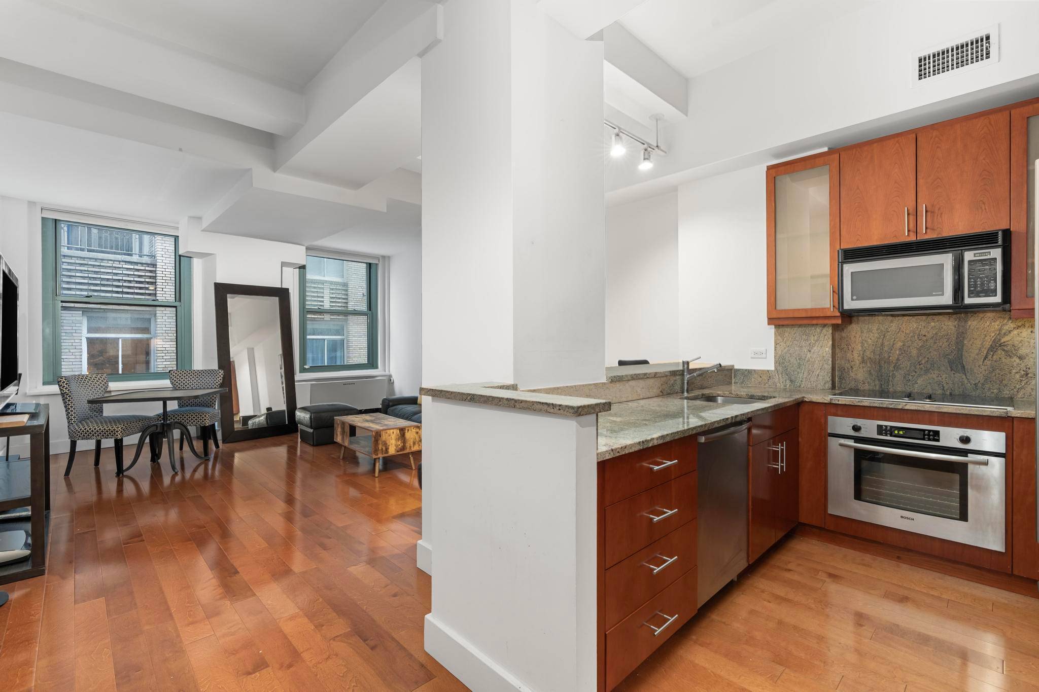 We are excited to present Unit 11E, a beautifully renovated loft with Home Office, Easily Used as a 1bedroom.