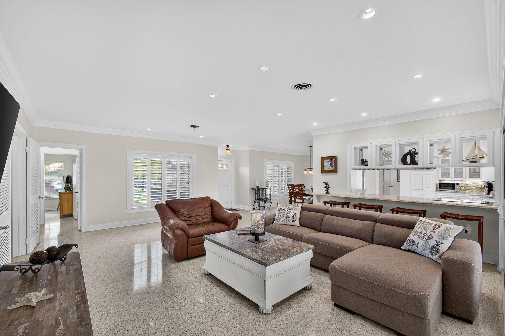 Beautiful 3 Bedroom, 3 Bath Home with 2 car garage in the wonderful Community of Palm Beach Isles.