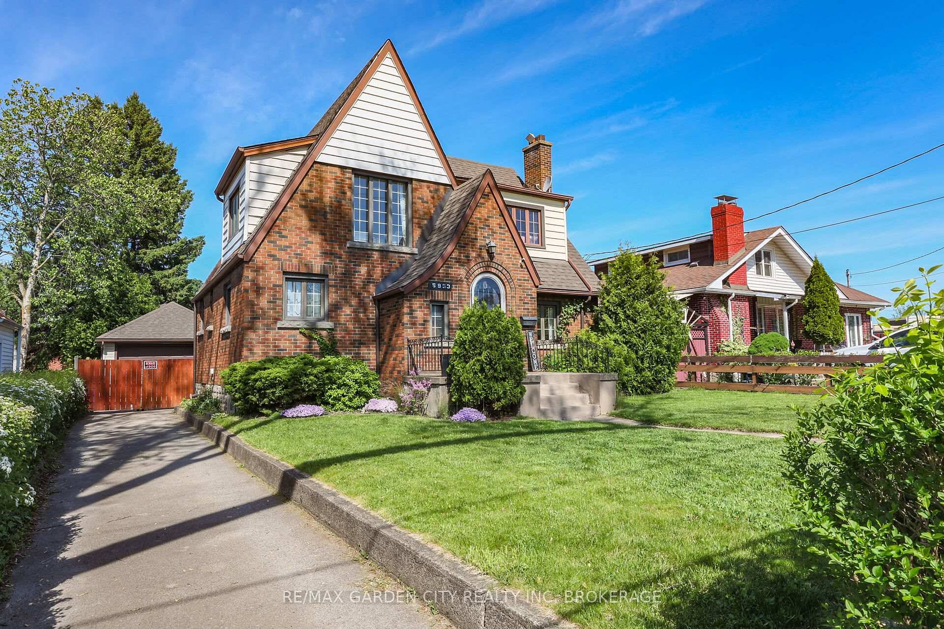 Check out the inviting curb appeal of this 3 bedroom brick character home.