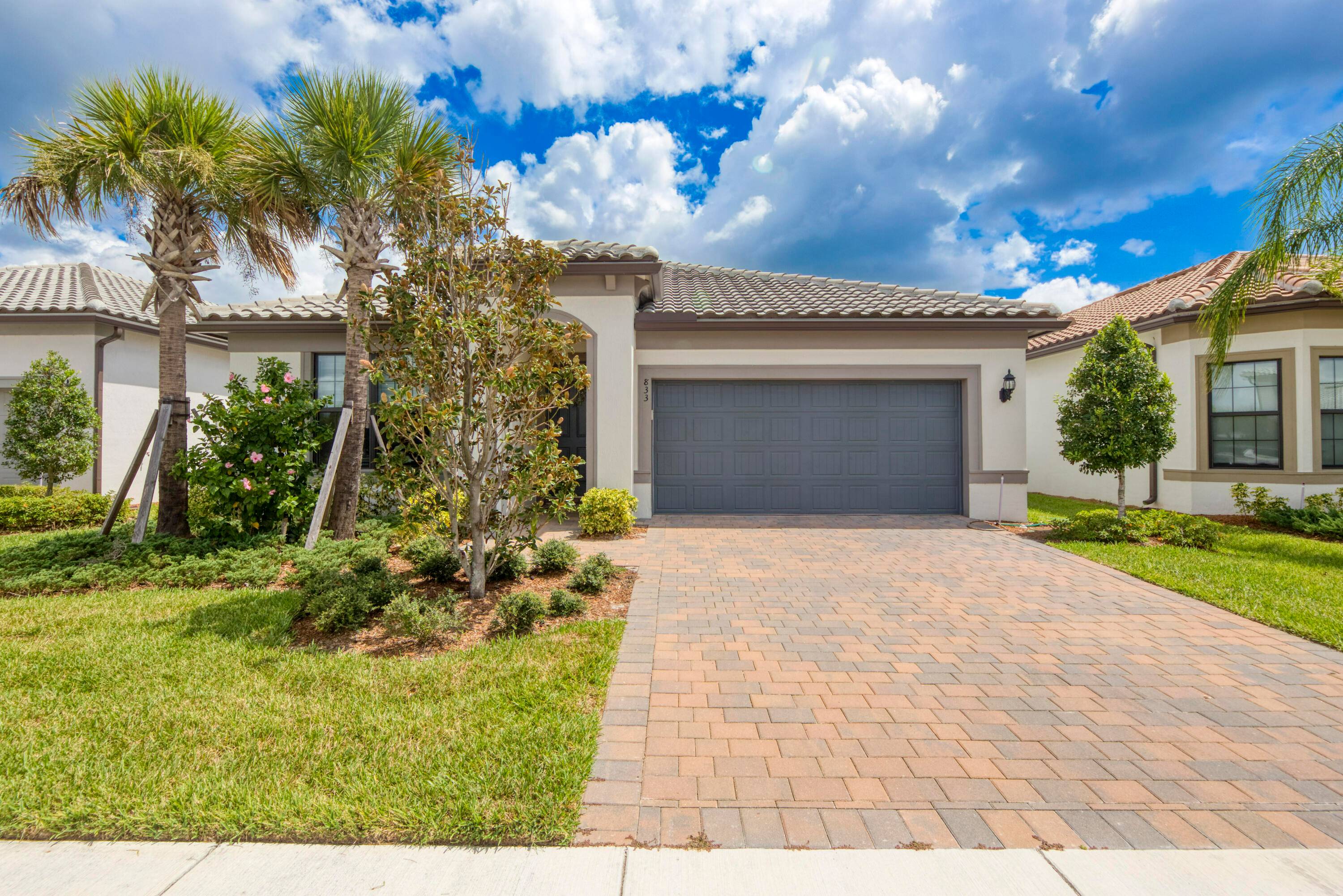 Welcome to this stunning 2023 Divosta 4 bedroom, 2 bath home in the highly desirable Veranda Gardens of Port Saint Lucie !