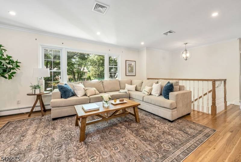 Welcome to this impeccably maintained 5 bedroom and 3.