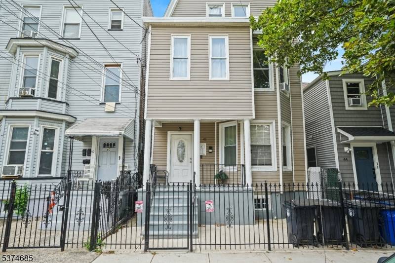 Welcome home to this renovated multifamily home in the desirable North Newark area.