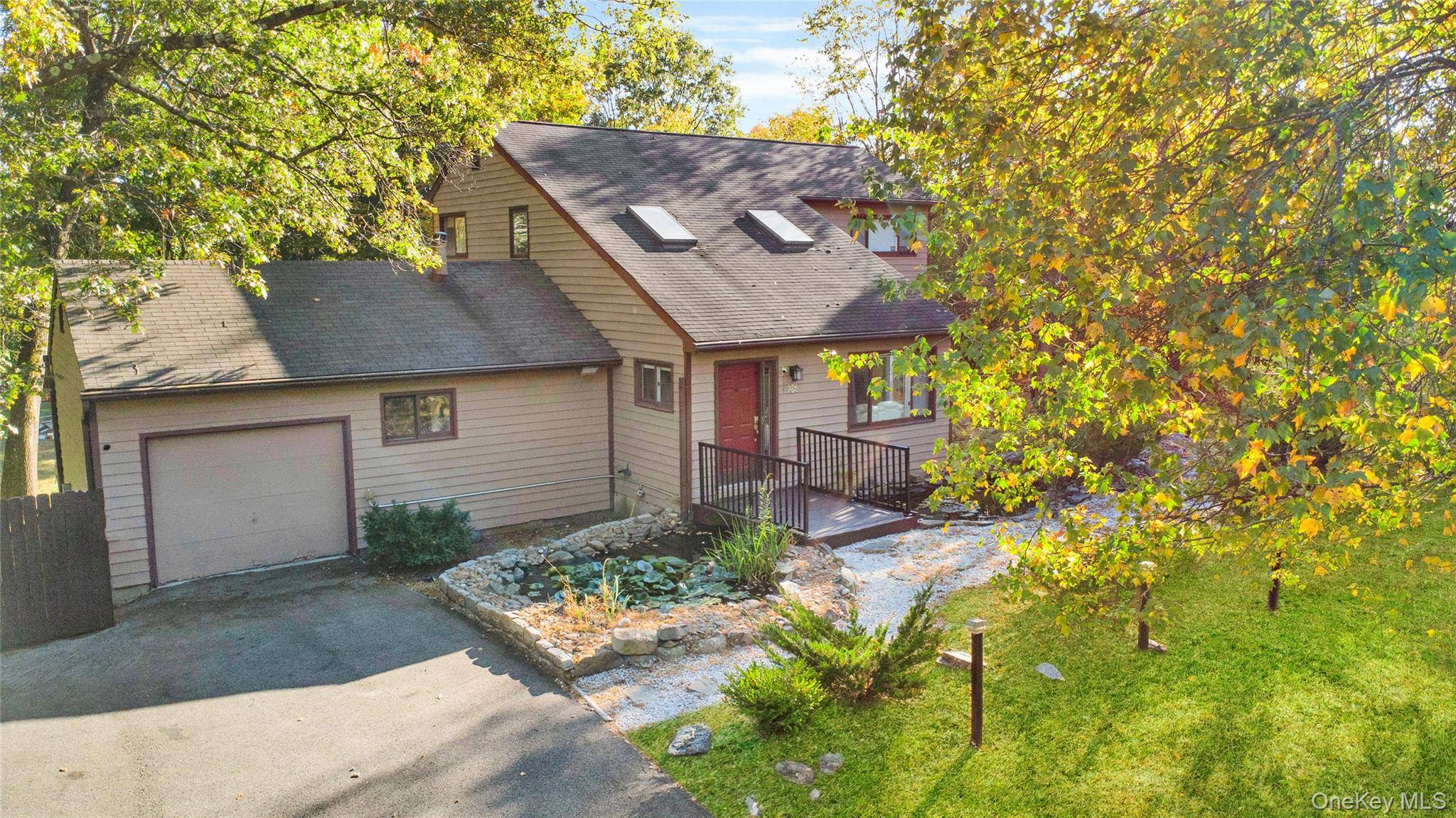 Tucked away on a tranquil, wooded 1.