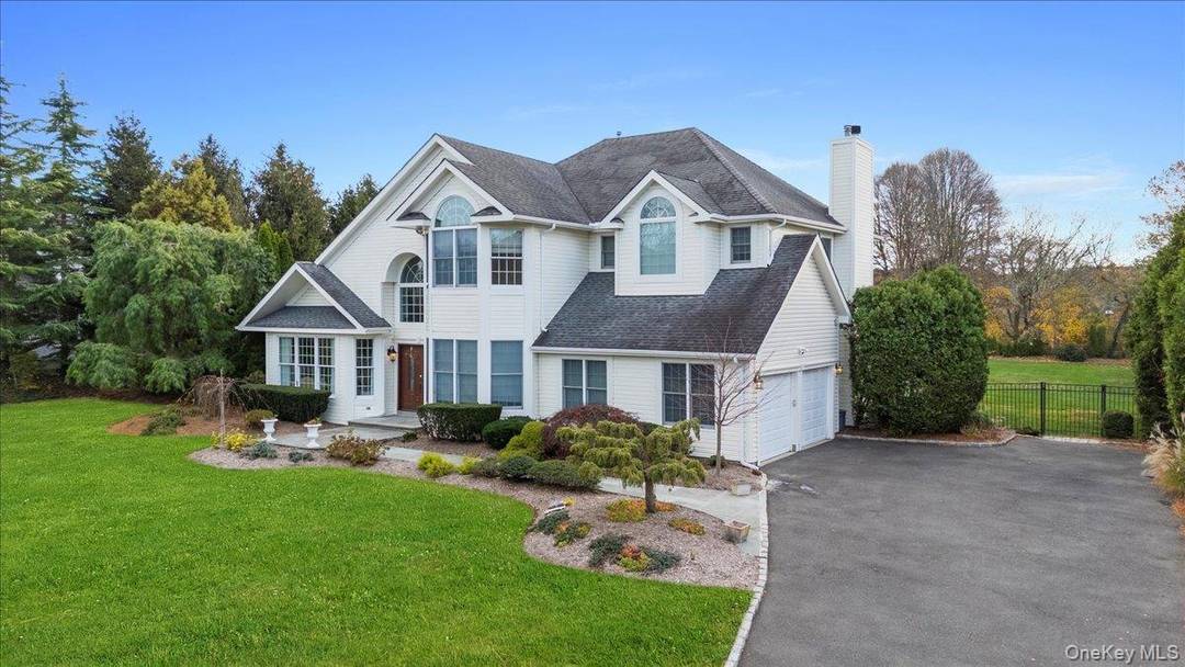 Discover luxurious living in the prestigious and private gated community of Dix Hills Farms.