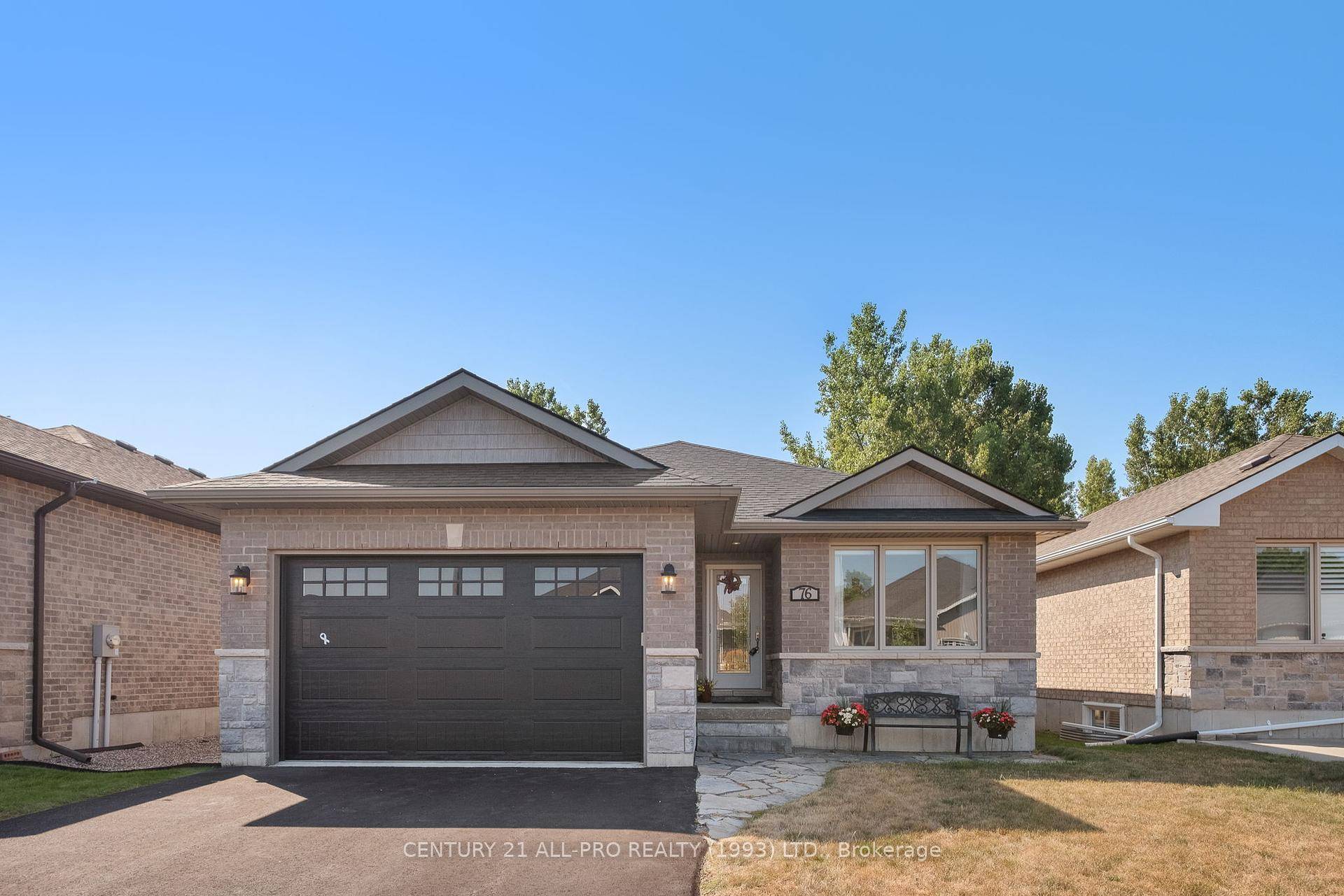 Welcome Home ! This stunning brick and stone bungalow has been lovingly cared for and is ready to welcome its new family.