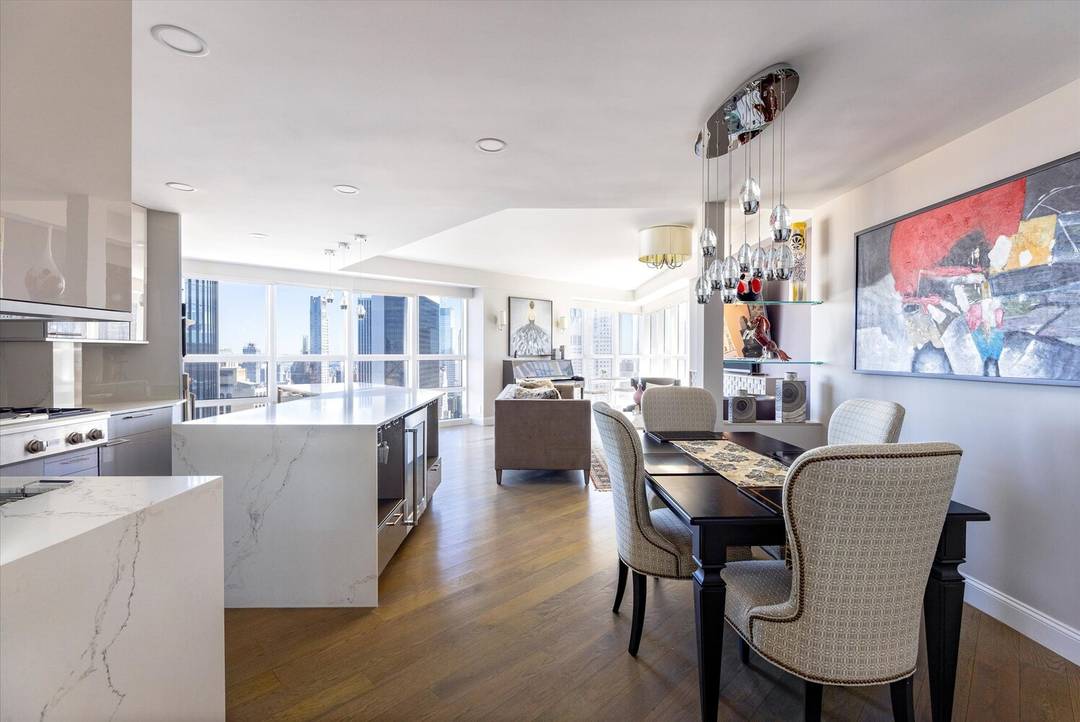 Welcome to your urban oasis nestled in the prestigious address of 146 West 57th Street, 57D.