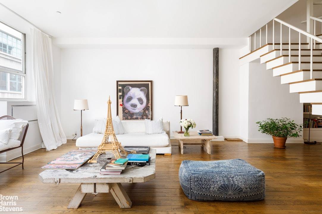 Located in prime historic landmarked SoHo, Apartment 4C 5C at 118 Wooster Street, at Prince Street, is a rare 2 3 bedroom, 2.
