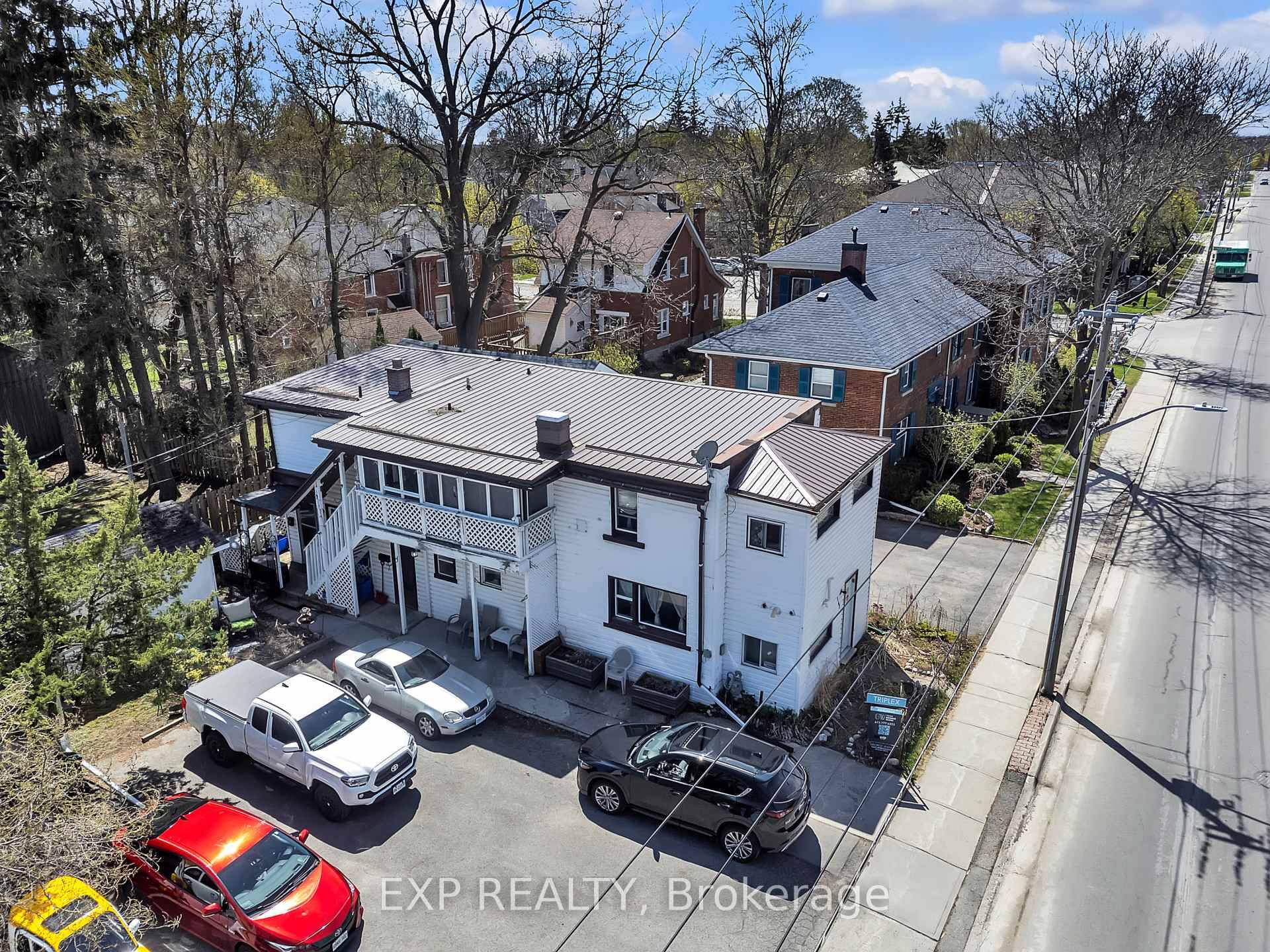 Fully occupied TRIPLEX in Belleville's sought after Old East Hill neighbourhood, featuring two 2 bedroom units and one 1 bedroom unit, each with separate hydro meters and private entrances.