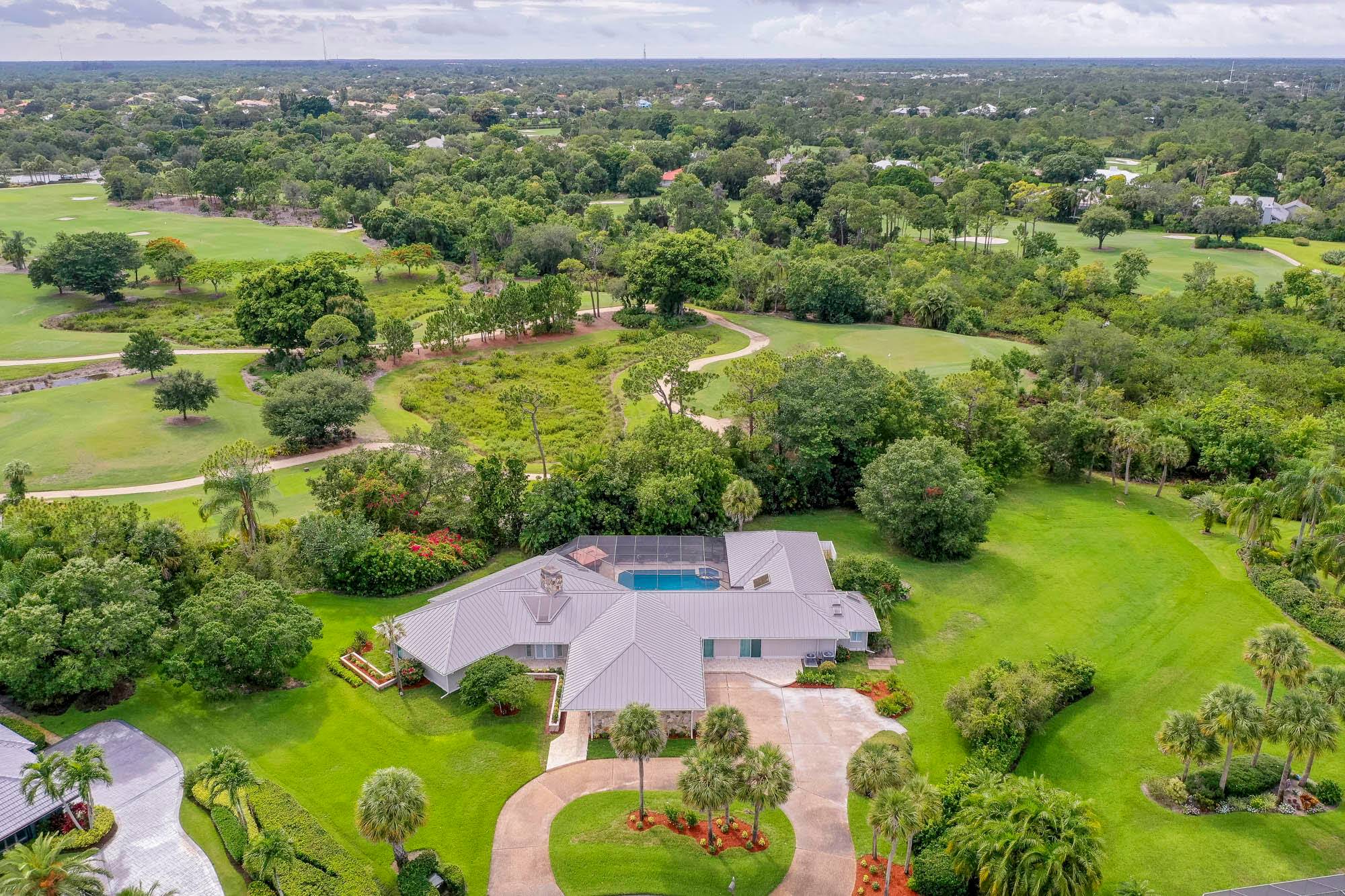 Spectacular home in Piper's Landing Yacht and Country Club, cul de sac with 1 acre.