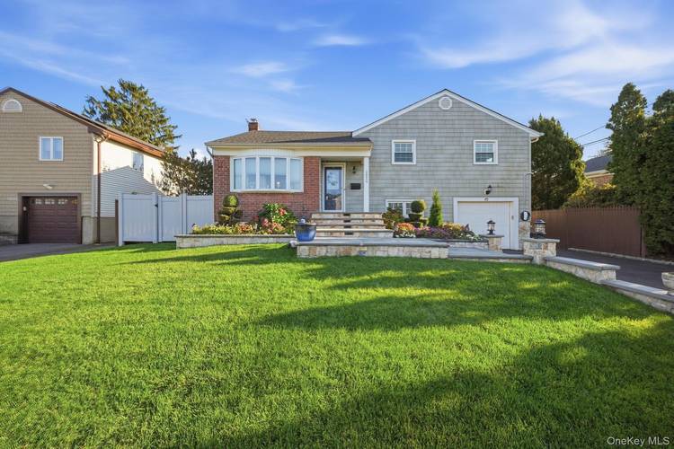 Beautifully Maintained Split Level Home with Spacious Living Areas and an Exceptional Backyard !