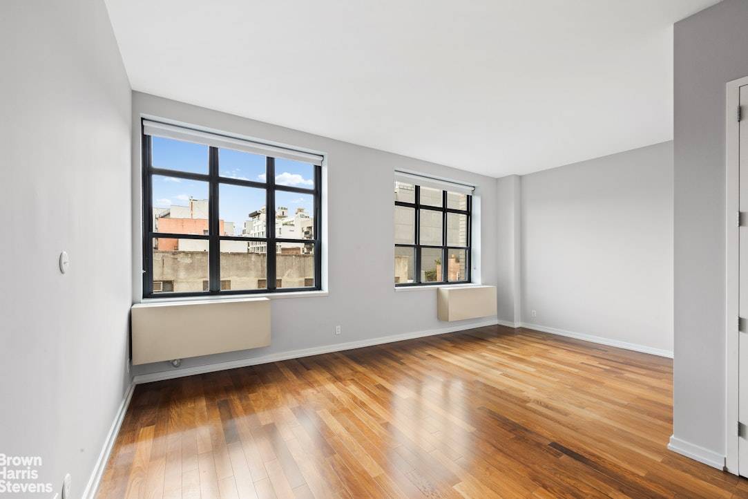 Welcome to this rarely available loft like studio and convertible one bedroom home.