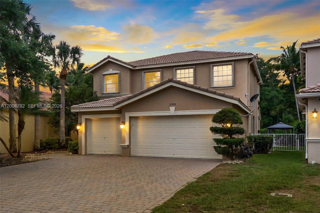 Welcome to one of Isola Bella's most sought after addresses, a stunning Mediterranean style pool home behind the gates of this prestigious Lake Worth community.