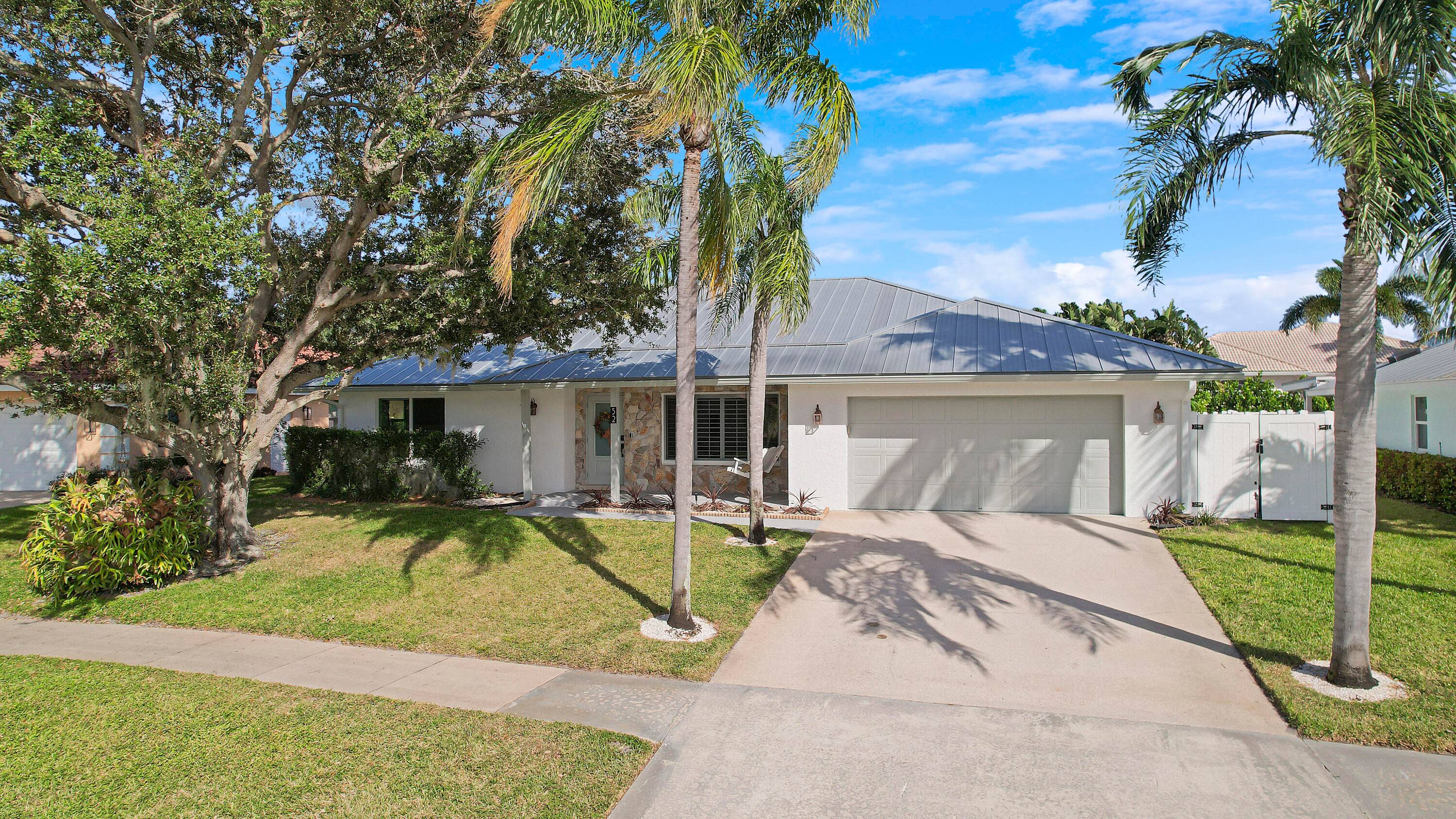 Welcome to your dream home in the heart of Tequesta Pines !