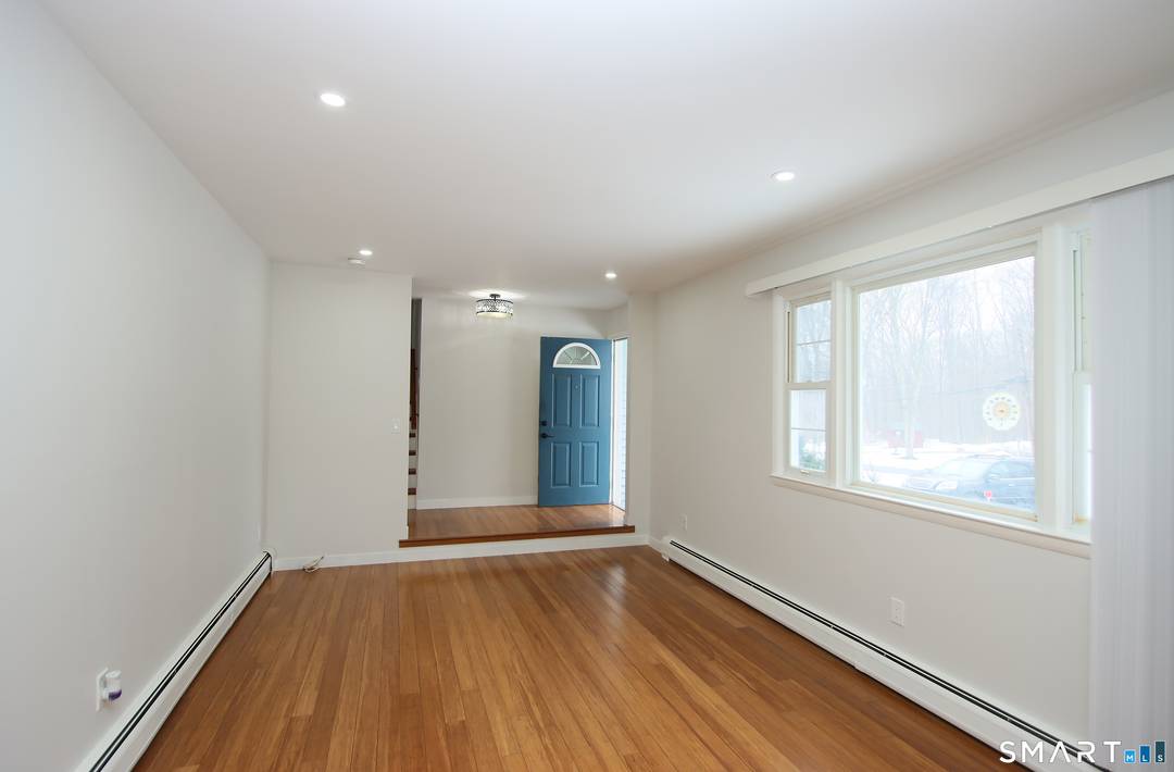 Gracefully updated, set on a generous, level corner lot property, in a peaceful neighborhood.