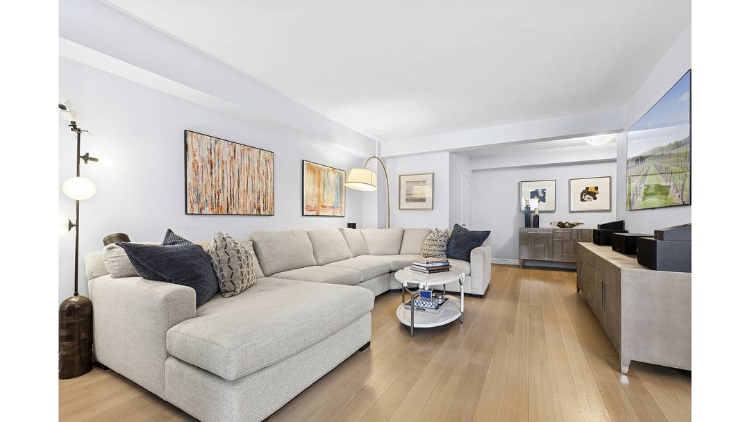 A grand entry foyer introduces this recently renovated, sun filled convertible three bedroom home.