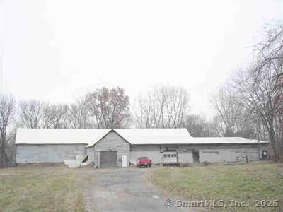 Unique opportunity to own a large 8000 sq ft agricultural building on 5.