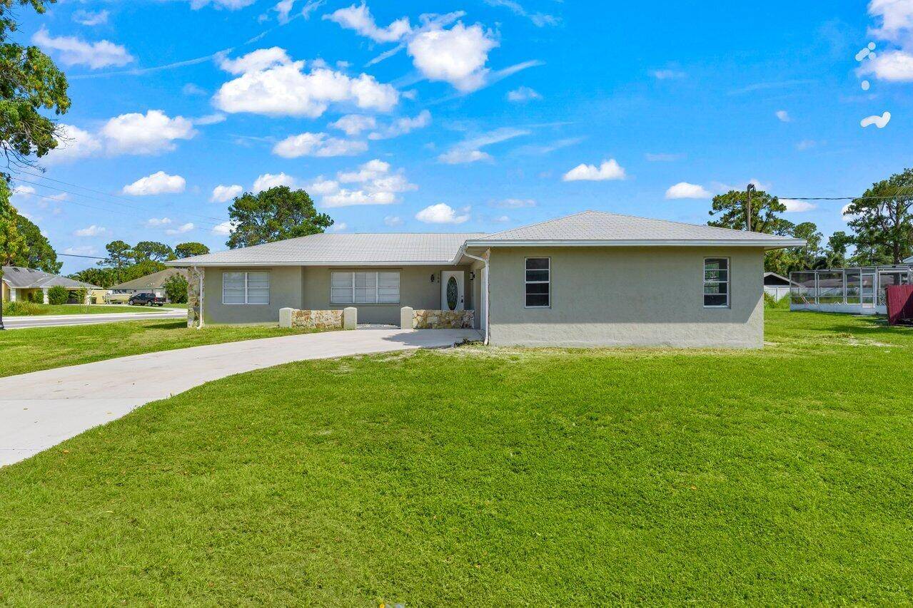 Beautifully renovated 3 bedroom, 2 bath home on a spacious corner lot with a resurfaced pool.