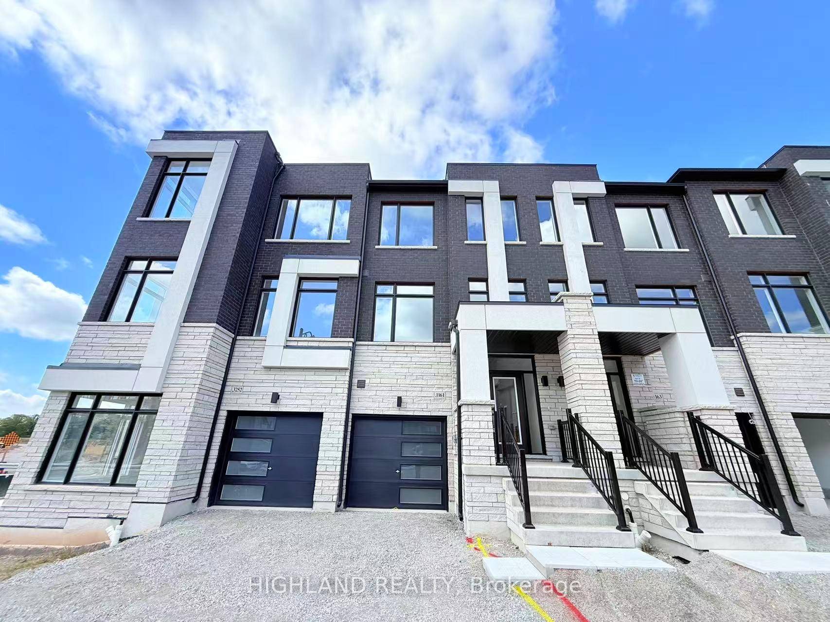Welcome to this Brand New Luxury Rear Lane Freehold 3 Storey Townhouse with Basement, Nestled in the Prestigious Joshua Creek Community of Oakville !
