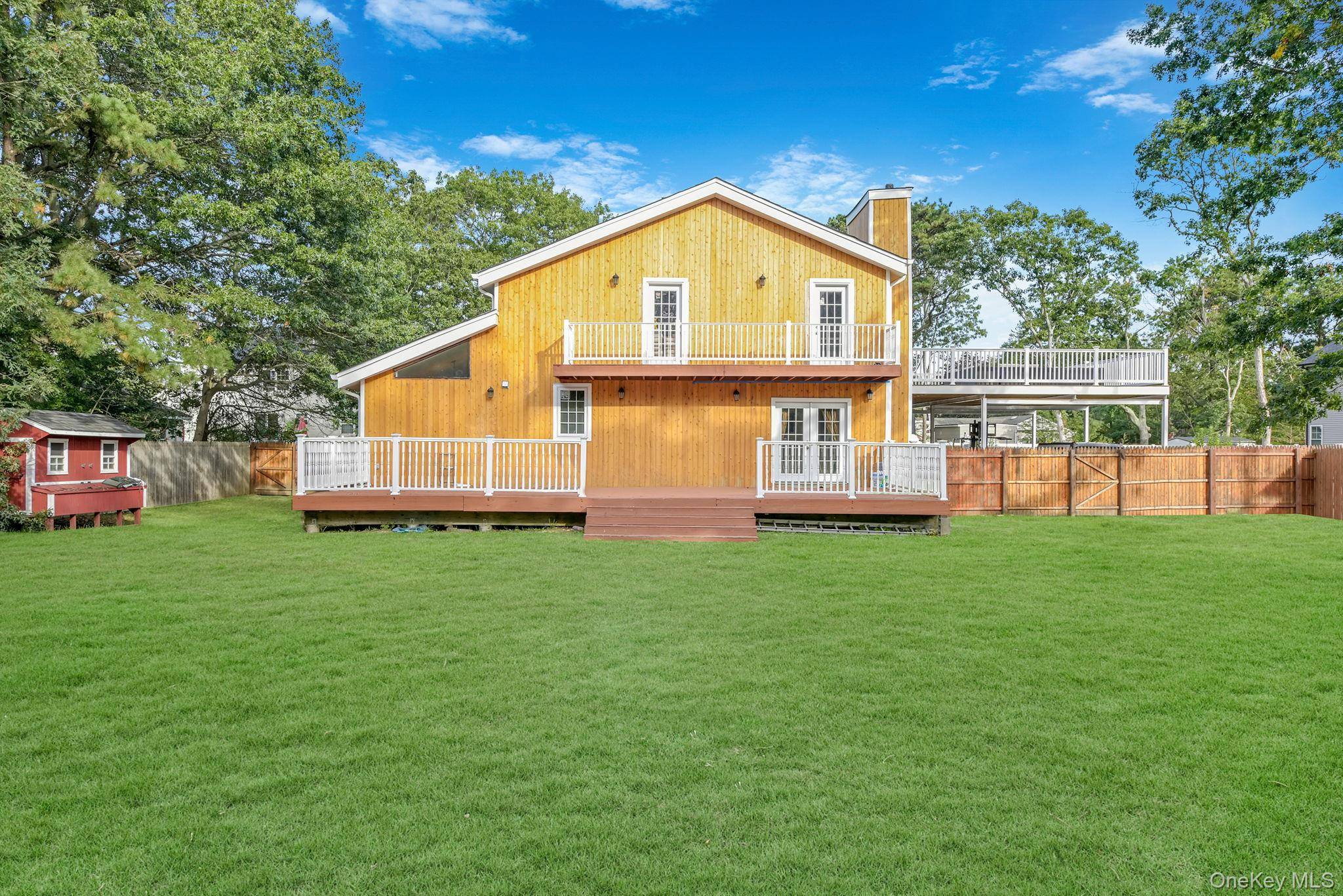 Enter onto the long driveway leading to this excitingly unique custom built home that sits on 1 Acre property.