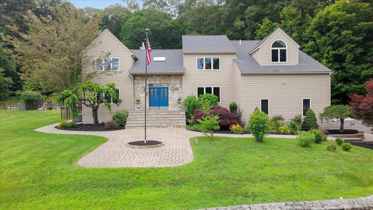Stunning Contemporary Colonial with Sunrise and Mountain Views Experience luxurious living in this beautifully updated 3 bedroom, 3 bath Contemporary Colonial offering 3372 square feet of refined living space on ...