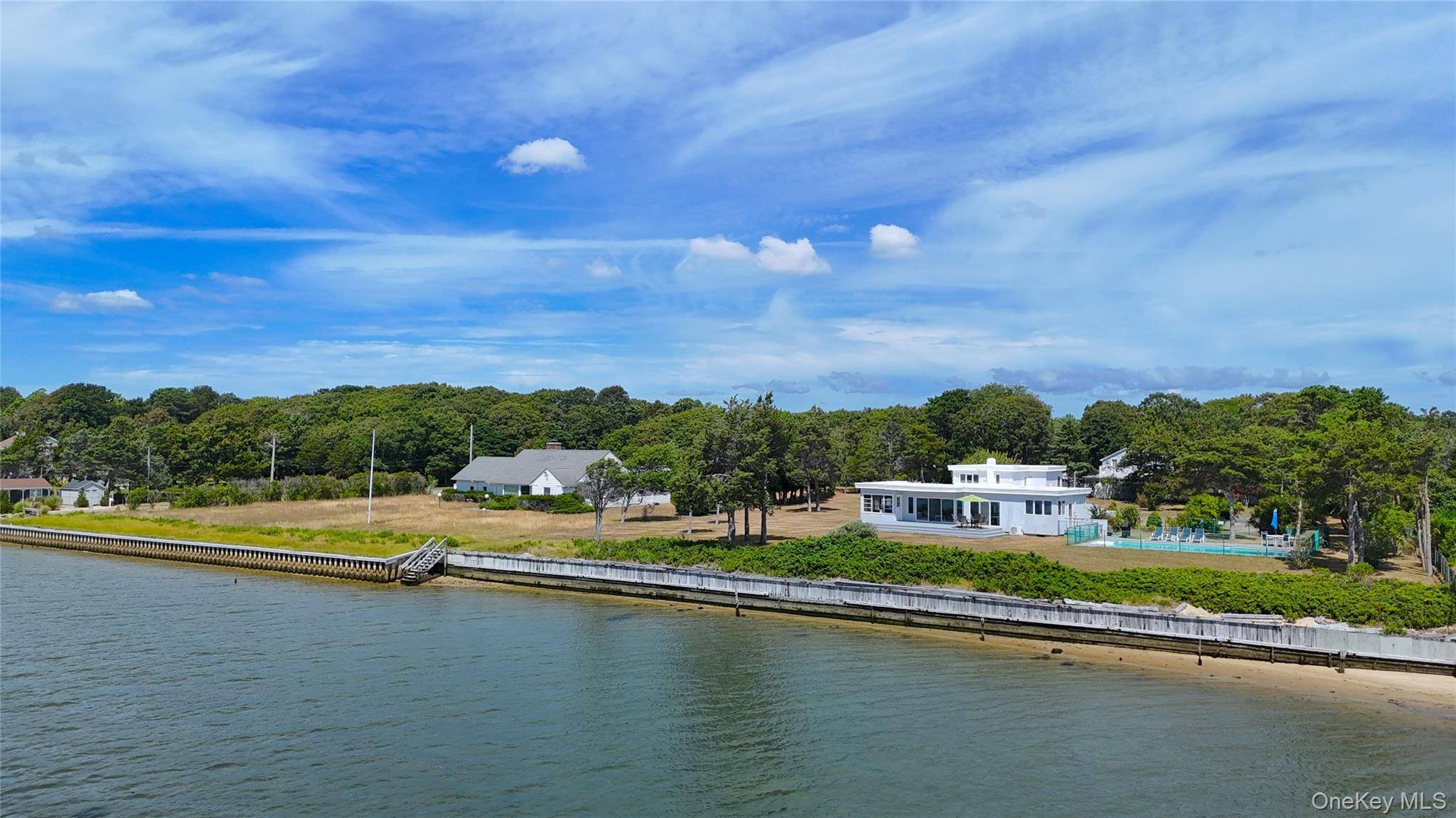 This is a truly special offering for the buyer who values both spectacular water views and limitless potential.