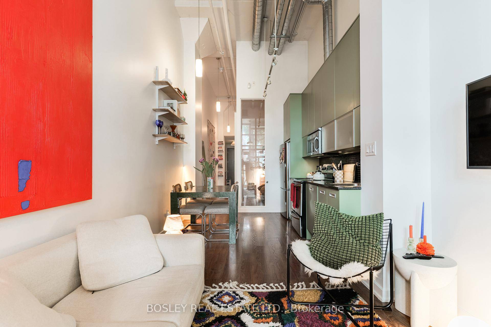 Your dream loft life awaits, a stunning and stylish true hard loft with 16ft ceilings, parking, locker, a private patio entrance, and excellent building amenities just steps from the subway.